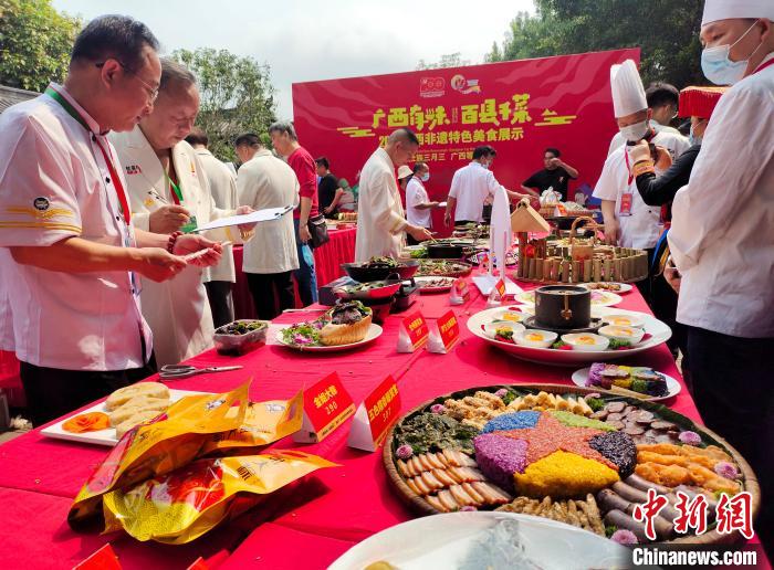 廣西辦非遺美食大賽慶?！叭氯卑倏h特色名菜打擂臺(tái)